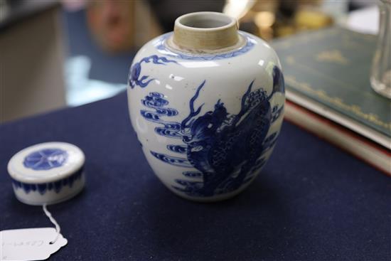 A Chinese blue and white qilin jar and cover, Kangxi period, H. 16cm, wood stand